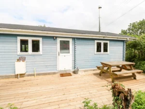 Rustic beach chalet with wood burner