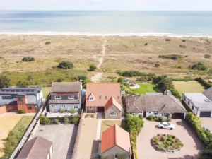 Beach house with hot tub by the sand dunes