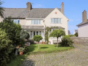 Family home with decking and lawn